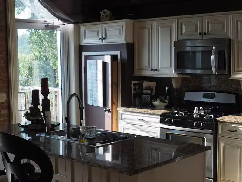 Full kitchen with granite island