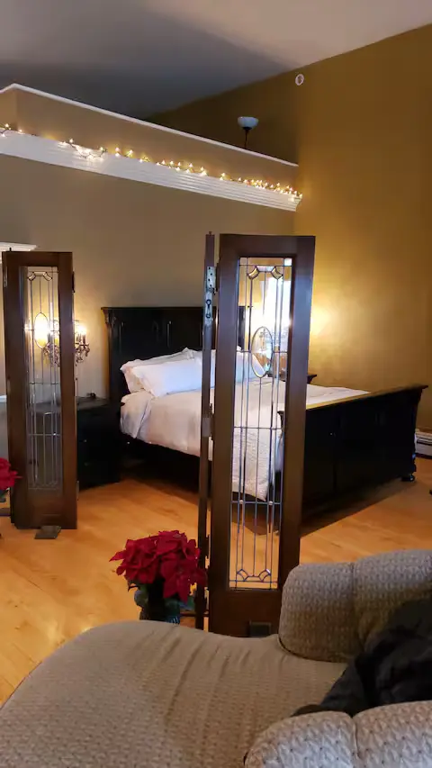 Bedroom with leaded-glass doors