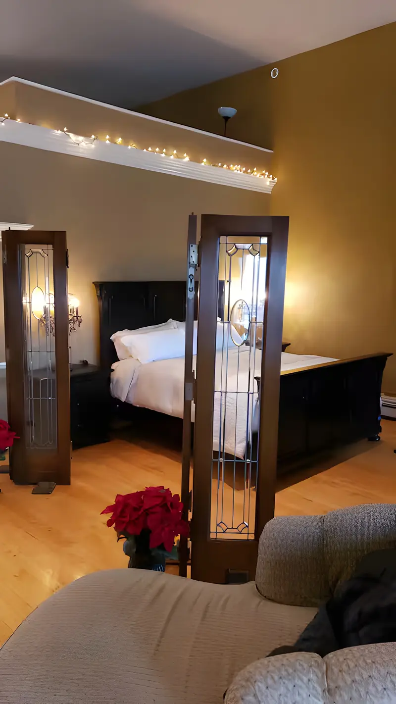 Bedroom with leaded-glass doors