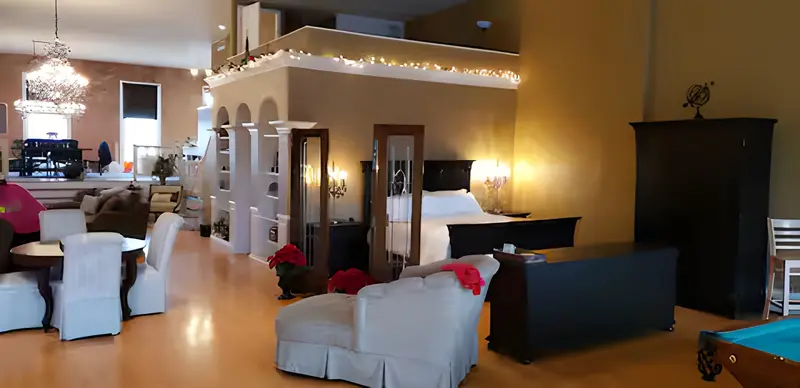 Open loft with seating and the 1875 pool table