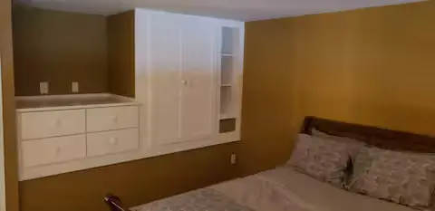Bedroom with built-in dresser