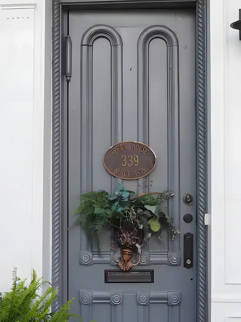 The original door with the Opera House 1875 plaque